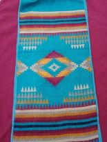 Southwestern-inspired soft Scarf measures approximately 74 inches long by 12 inches wide